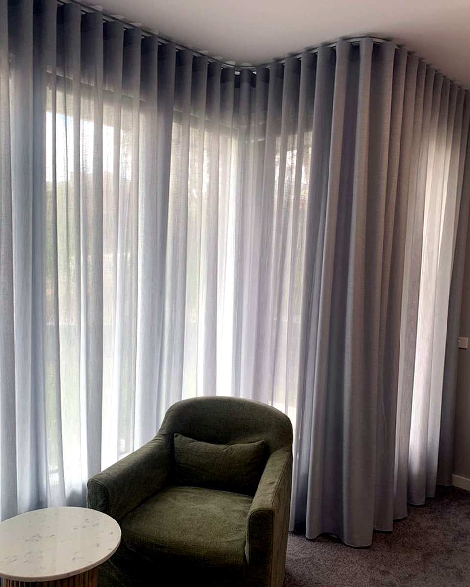 Wave fold sheer curtains in a Melbourne living room